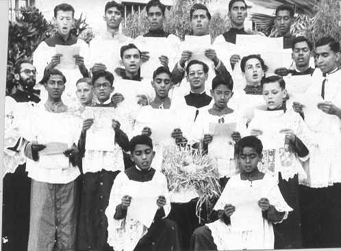 Some of the old students in a choir in 1950, many are called few are chosen, one became a priest, Fr. Hedwig DaCosta